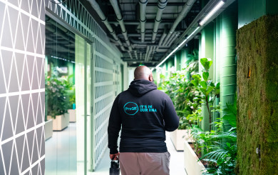 ProQRian walking the hallway of our office