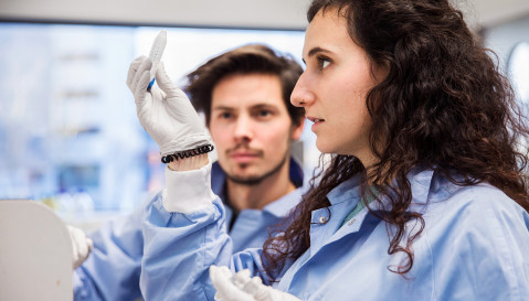 Two ProQR scientists working in the lab
