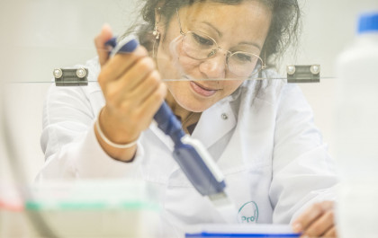 A ProQRian working on a cell culture in the laboratory