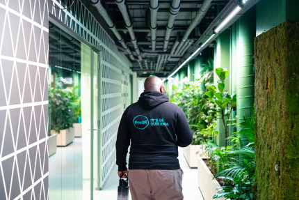 ProQRian walking the hallway of our office