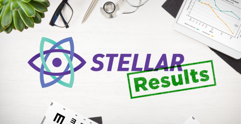 The Stellar logo with a green stamp 'Results' displayed on a desk scattered with a plant, an eye chart, glasses, and a graph.