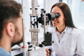 Ophthalmologist doing eye measurements