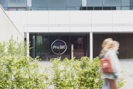 In front of the entrance of the ProQR office