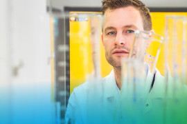 Male scientist working in the lab